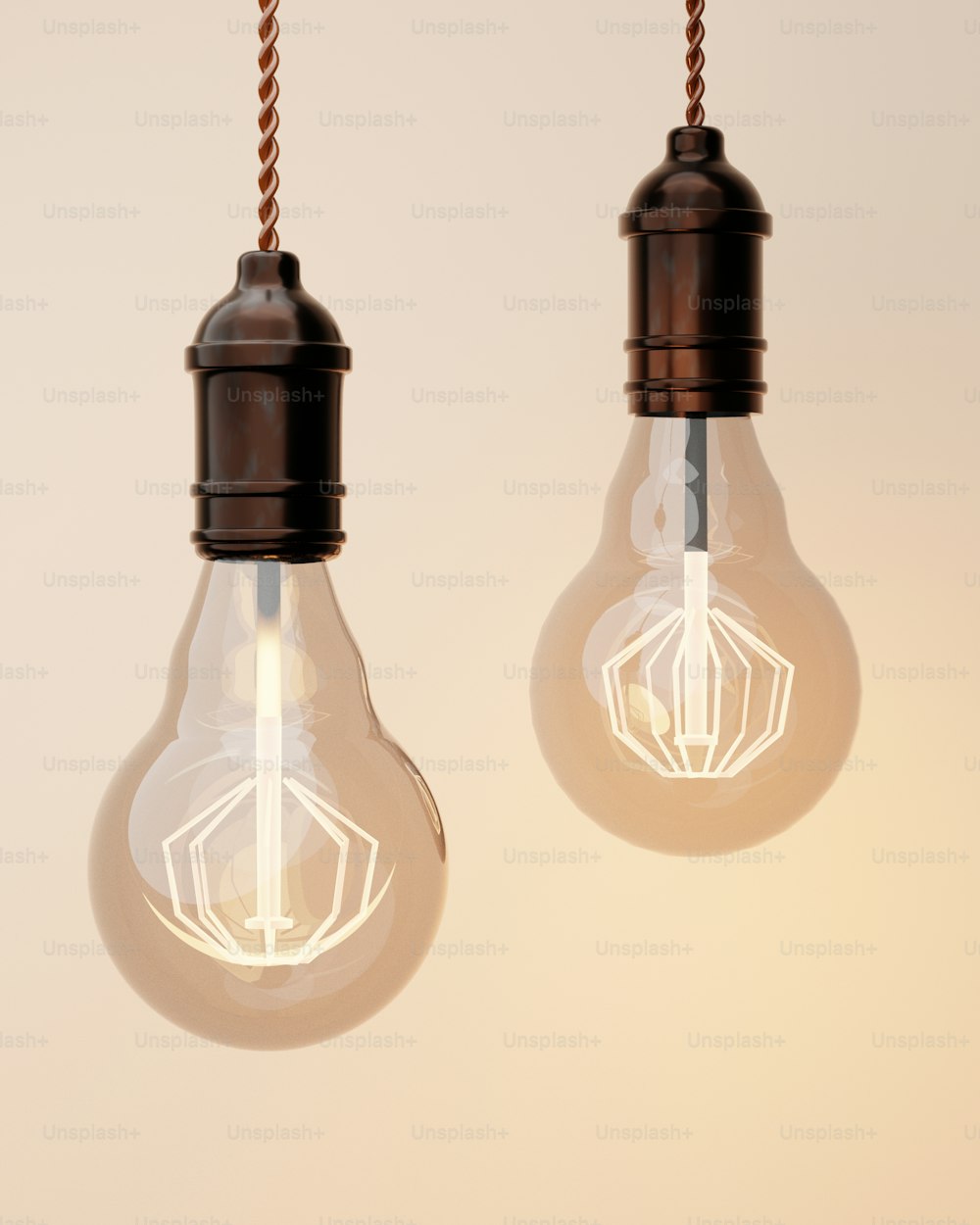 a couple of light bulbs hanging from a ceiling