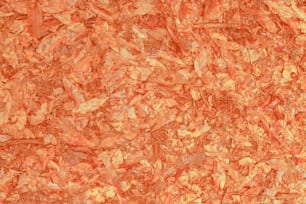 a close up view of a red marble surface