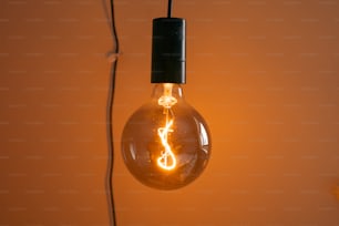 a light bulb that has a clock inside of it