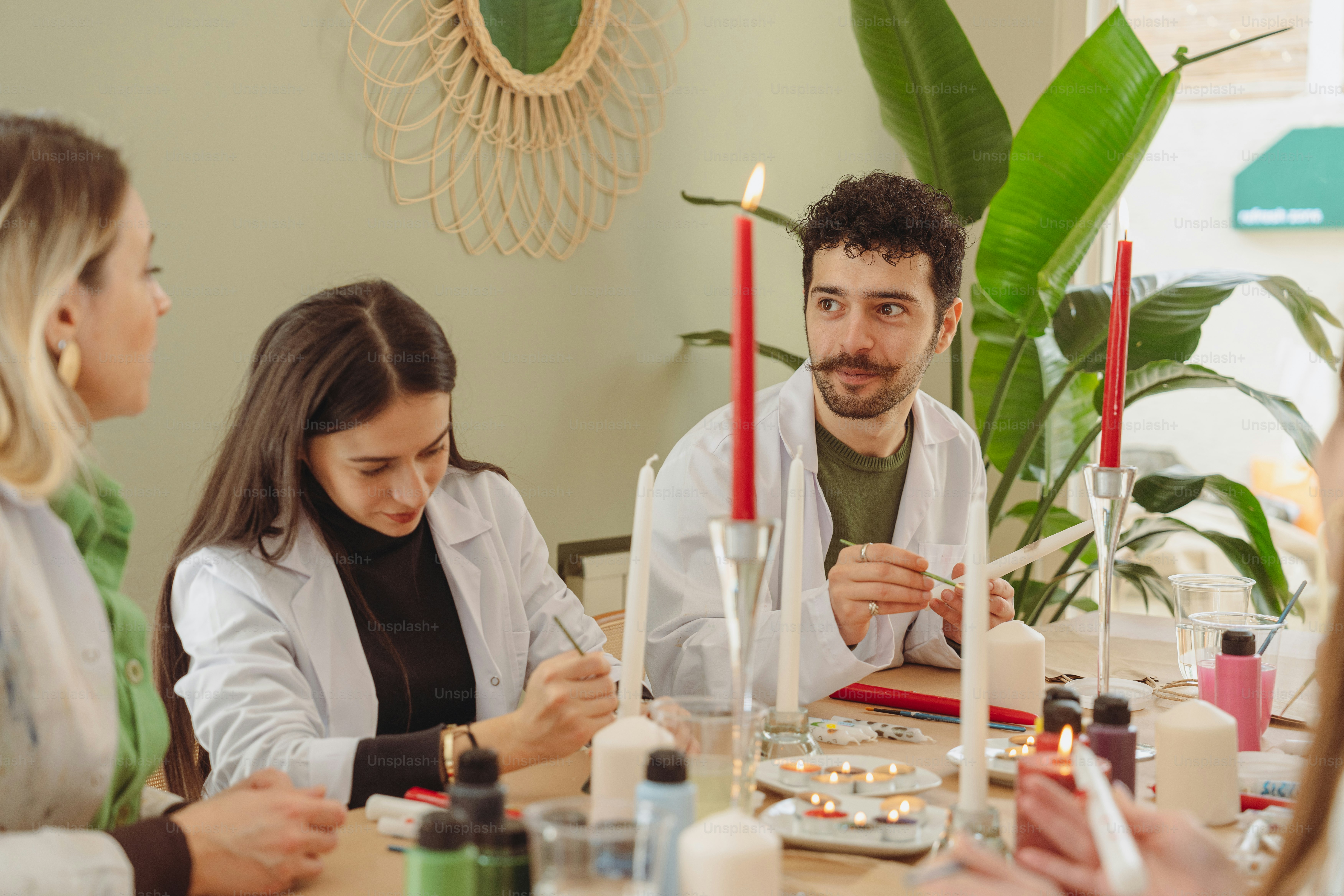 a group of people sitting around a table