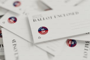 a pile of white business cards with red, white and blue stickers