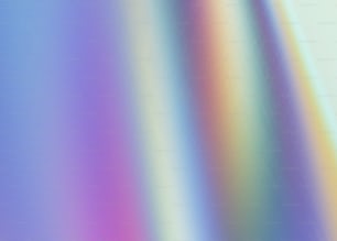 a blurry image of a rainbow colored background