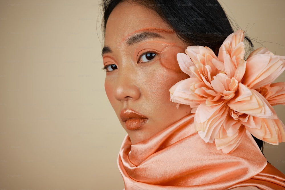 a woman with a flower in her hair