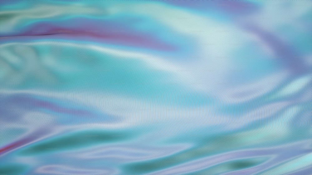 a close up of a blue and green swirled background