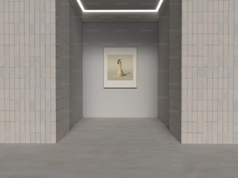 uma sala vazia com uma pintura na parede