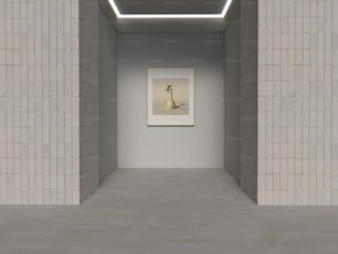 una stanza vuota con un dipinto sul muro