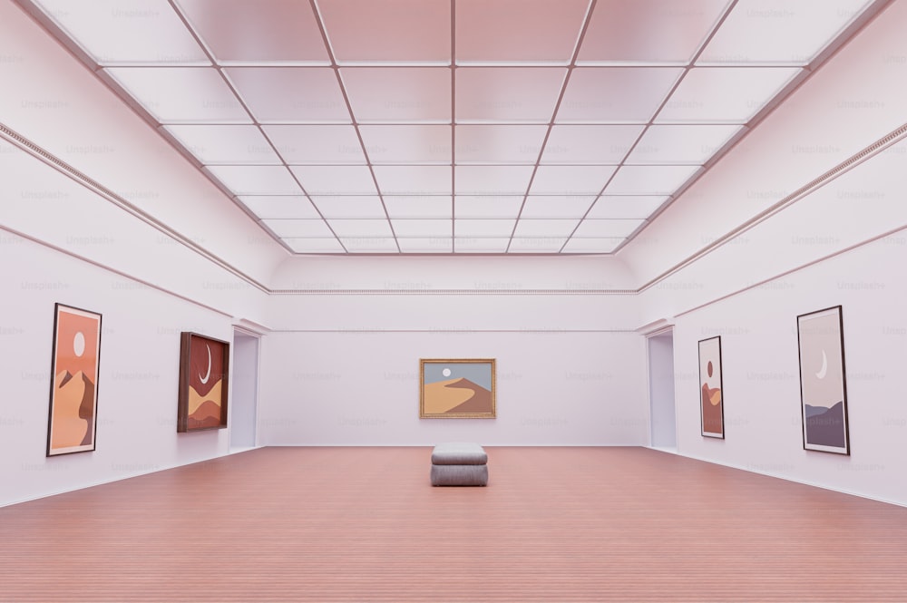an empty room with paintings on the wall