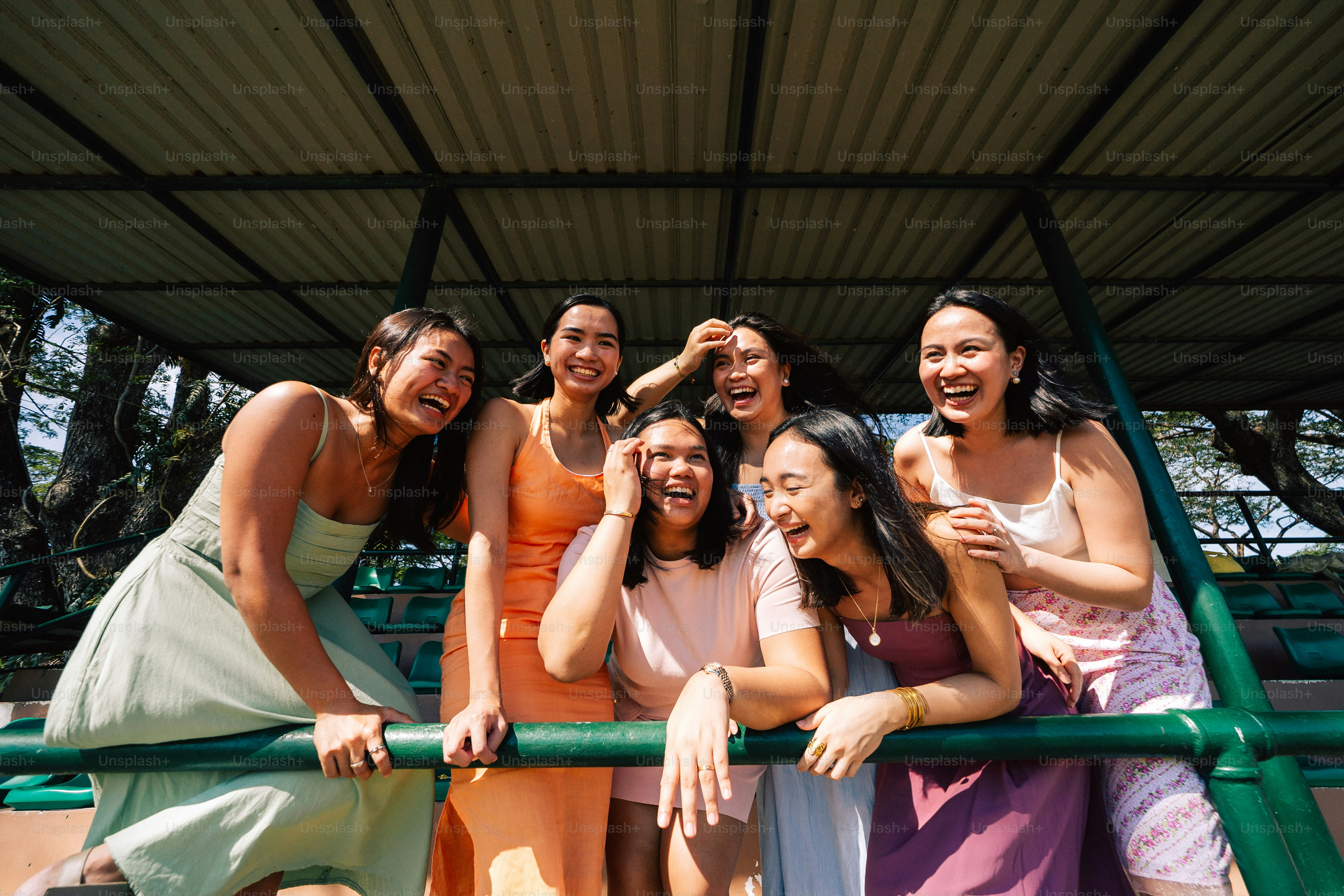 a group of young women standing next to each other