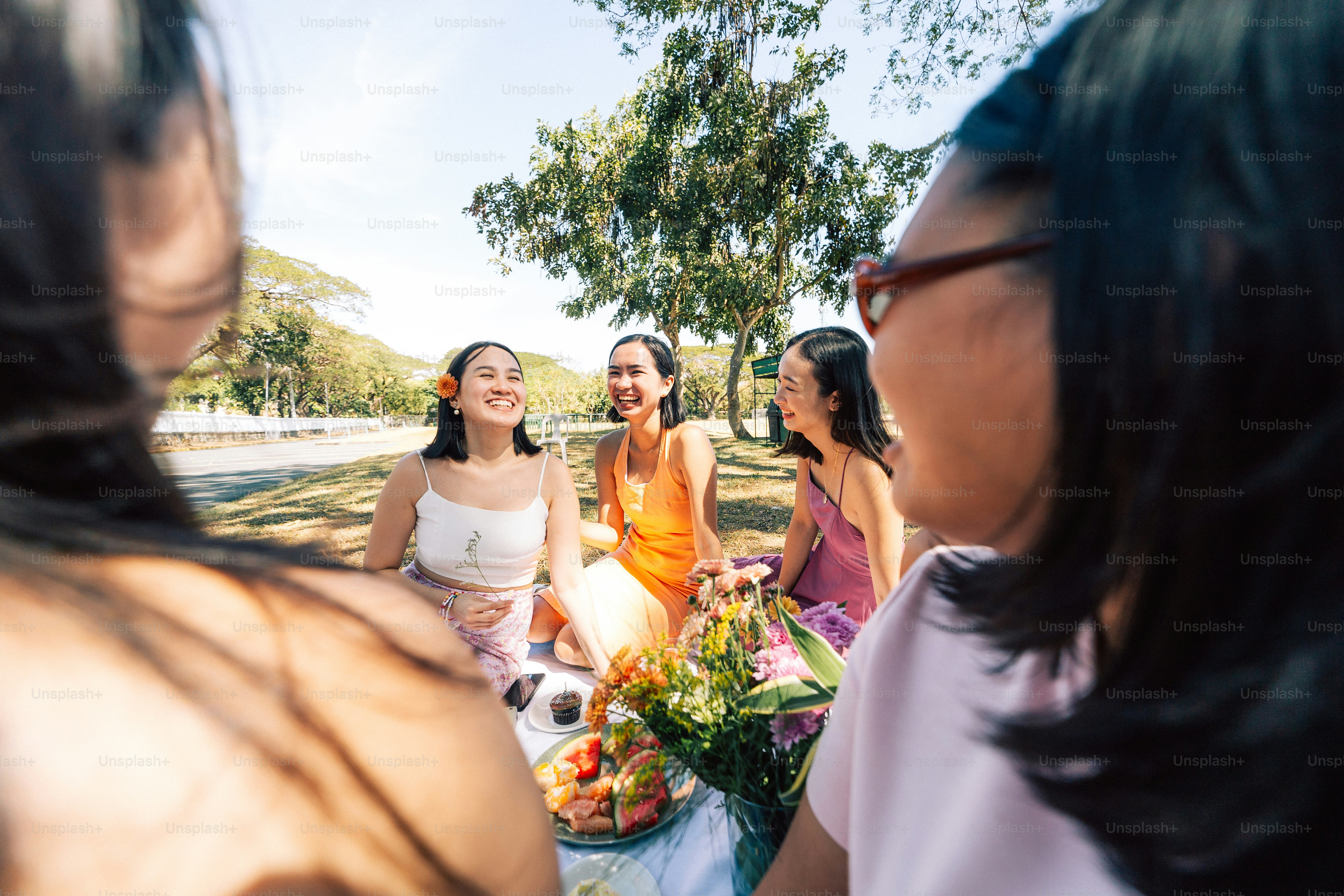 a group of women sitting next to each other