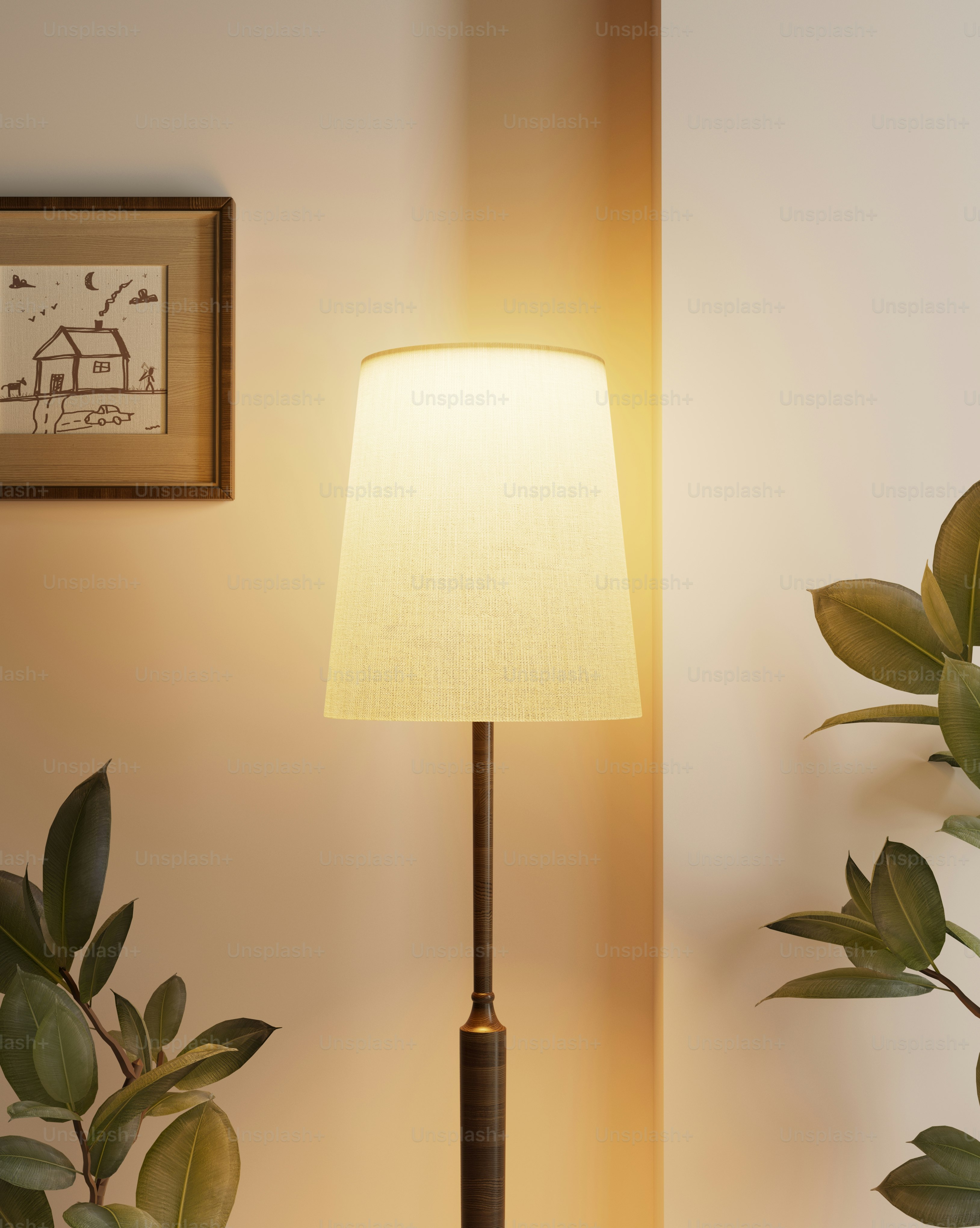 a lamp on a table next to a potted plant