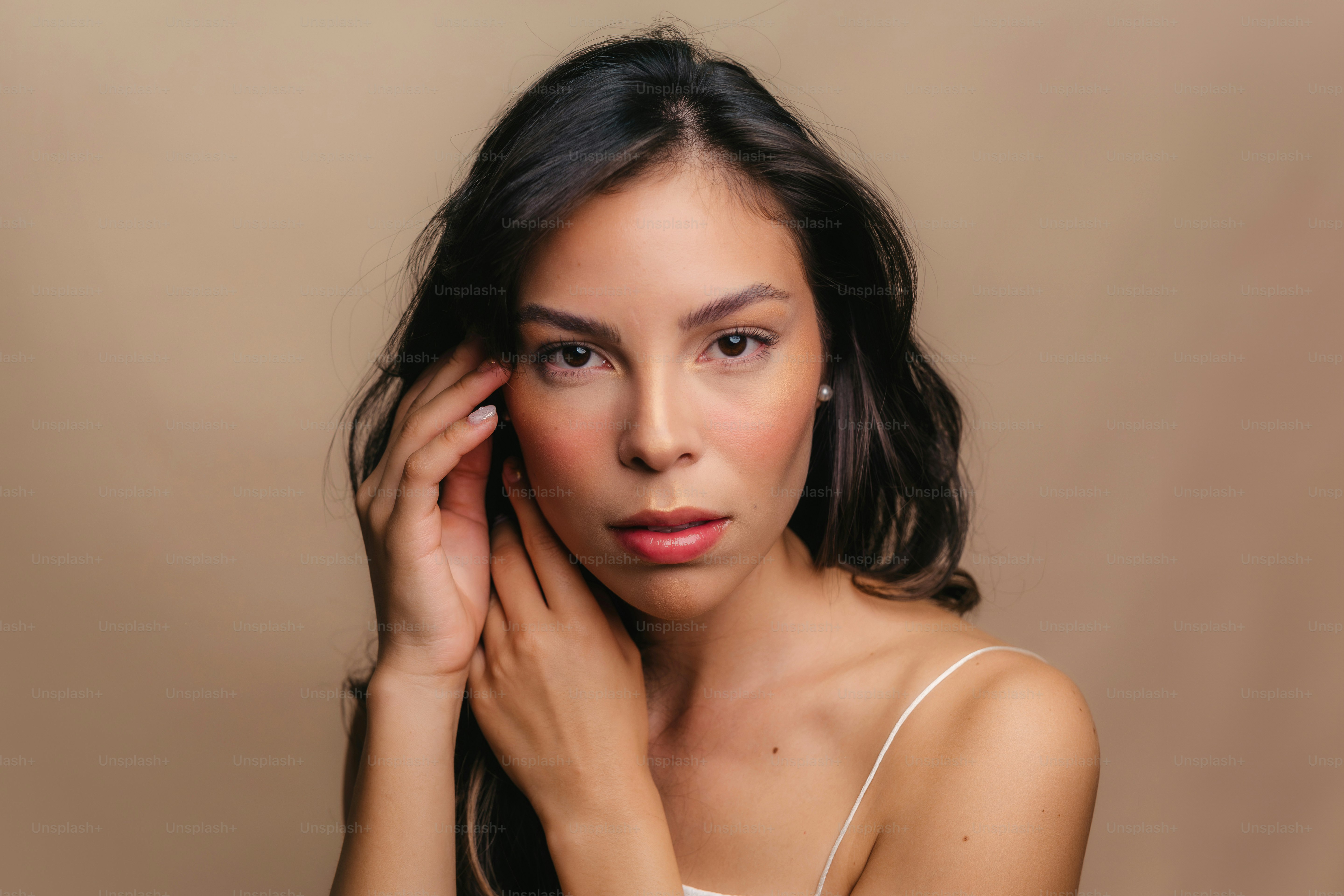 a beautiful young woman posing for a picture