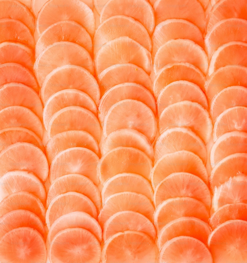 a close up of a bunch of sliced oranges