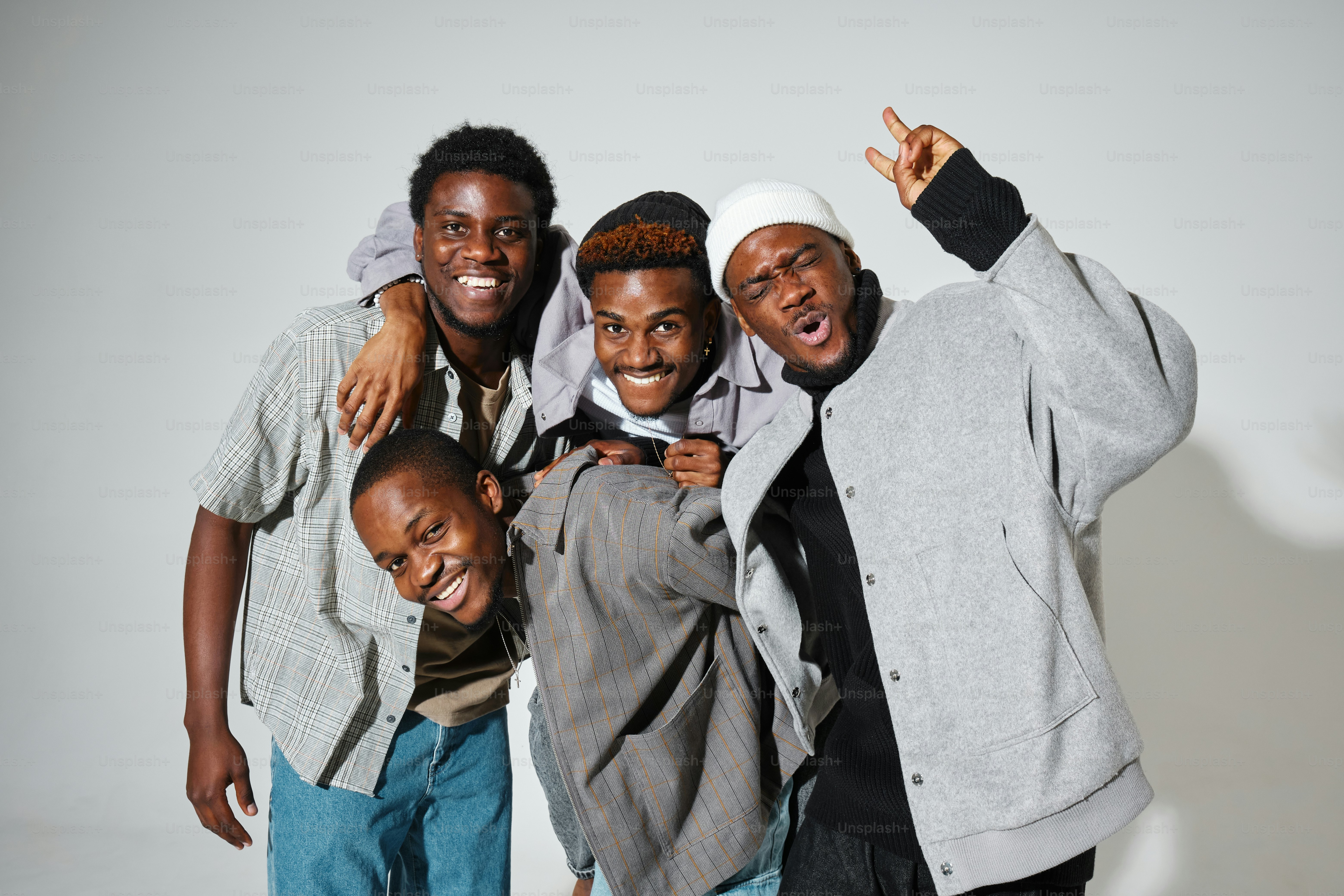 a group of young men standing next to each other