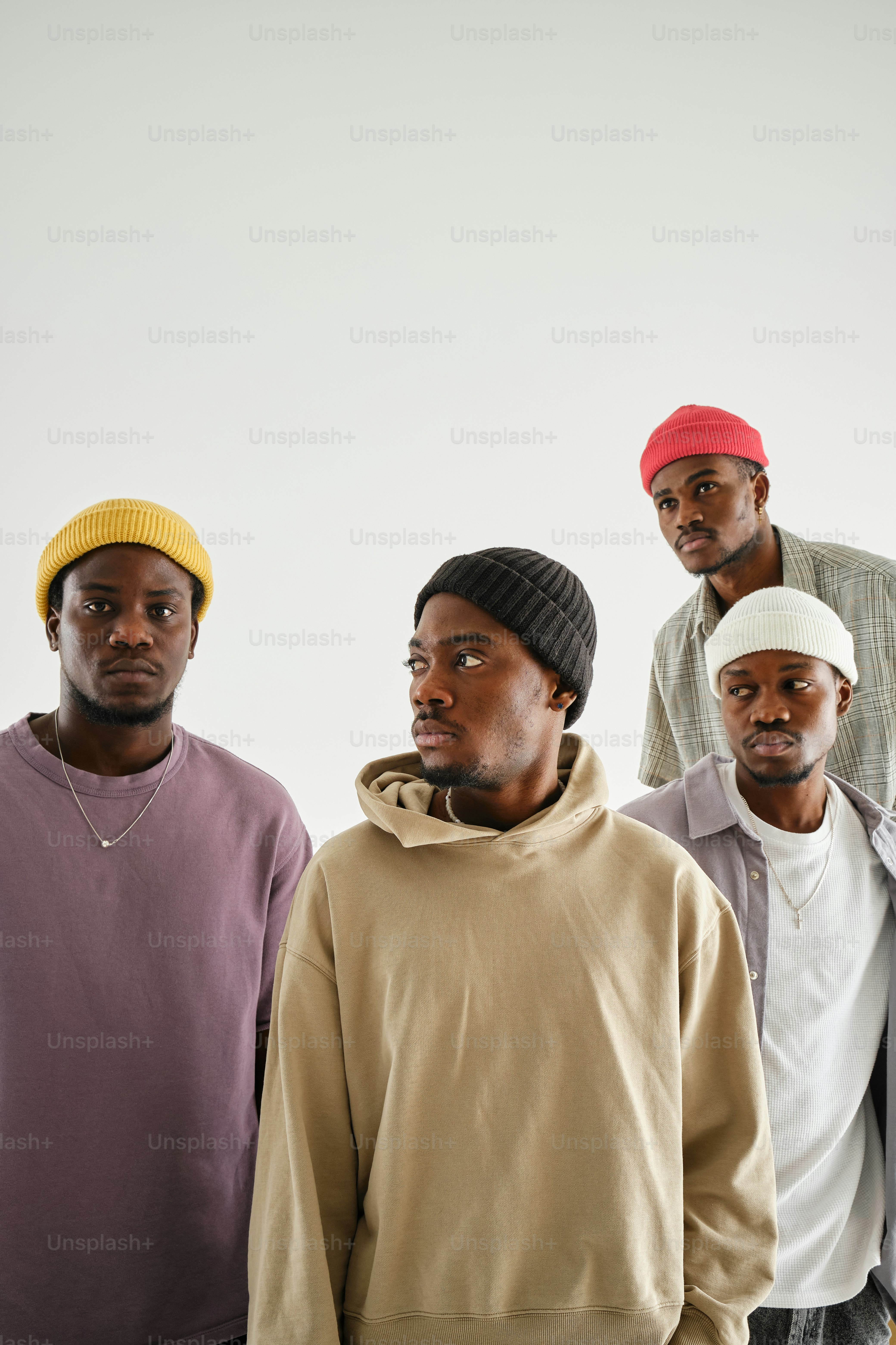 a group of young men standing next to each other