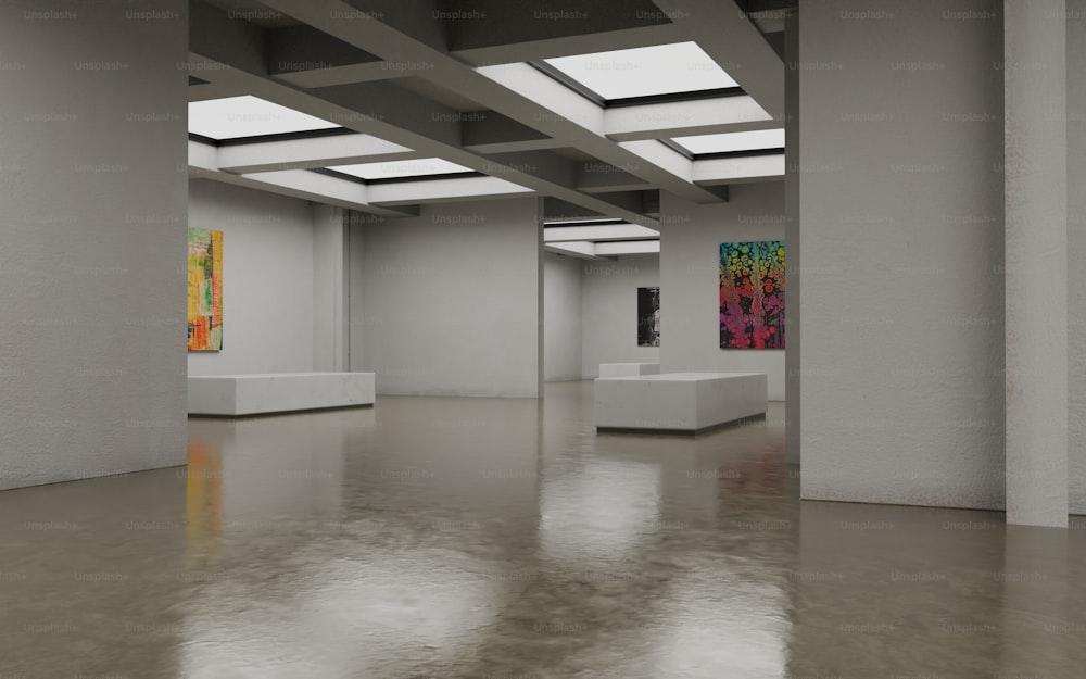 an empty room with paintings on the walls