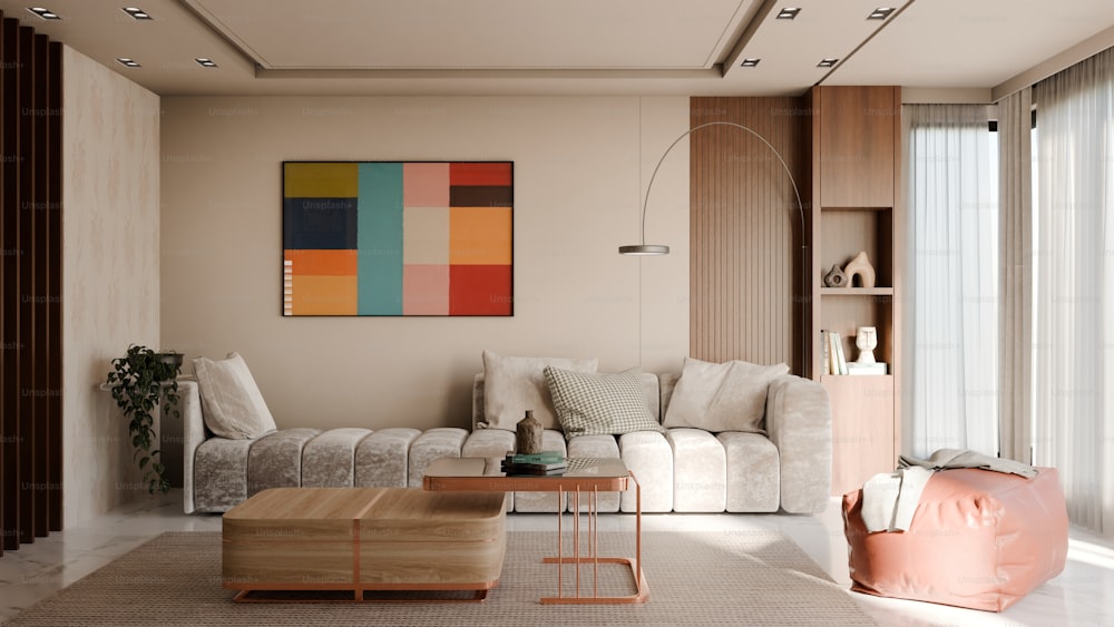 a living room filled with furniture and a painting on the wall