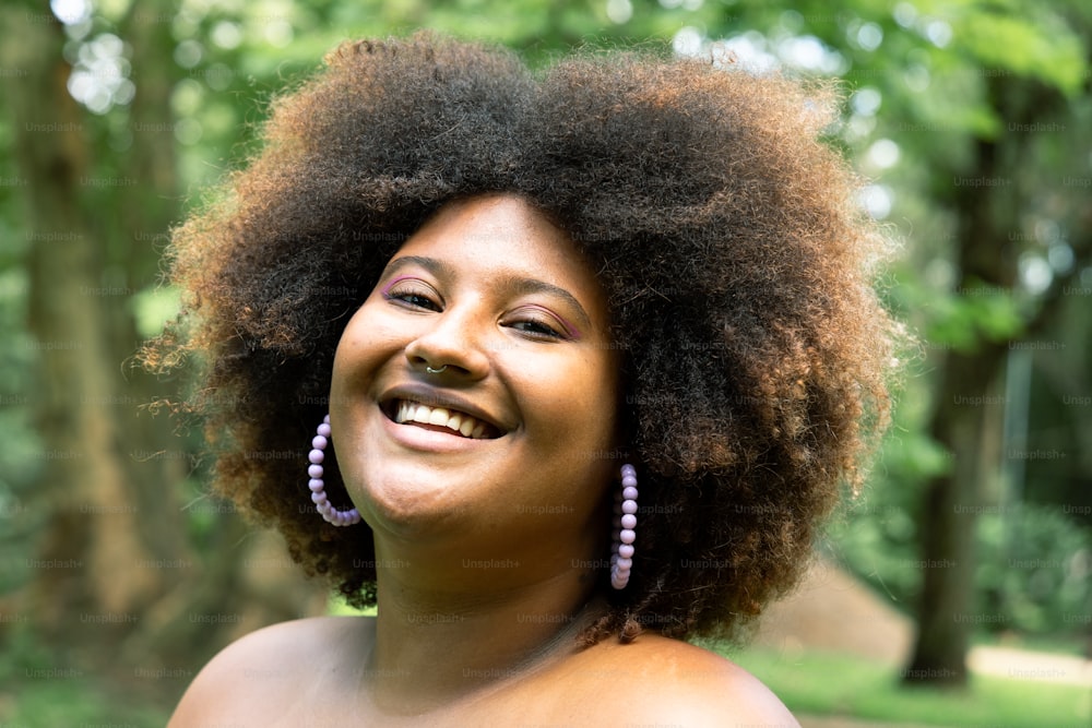 a close up of a person with an afro
