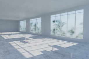 an empty room with large windows and benches