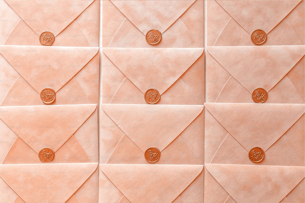 a close up of a wall made of envelopes