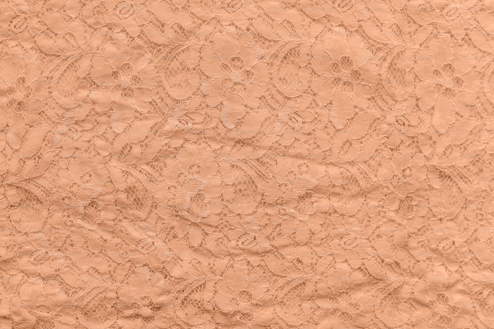 a close up of a textured paper with a design on it