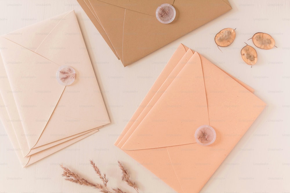 a couple of envelopes sitting on top of a table