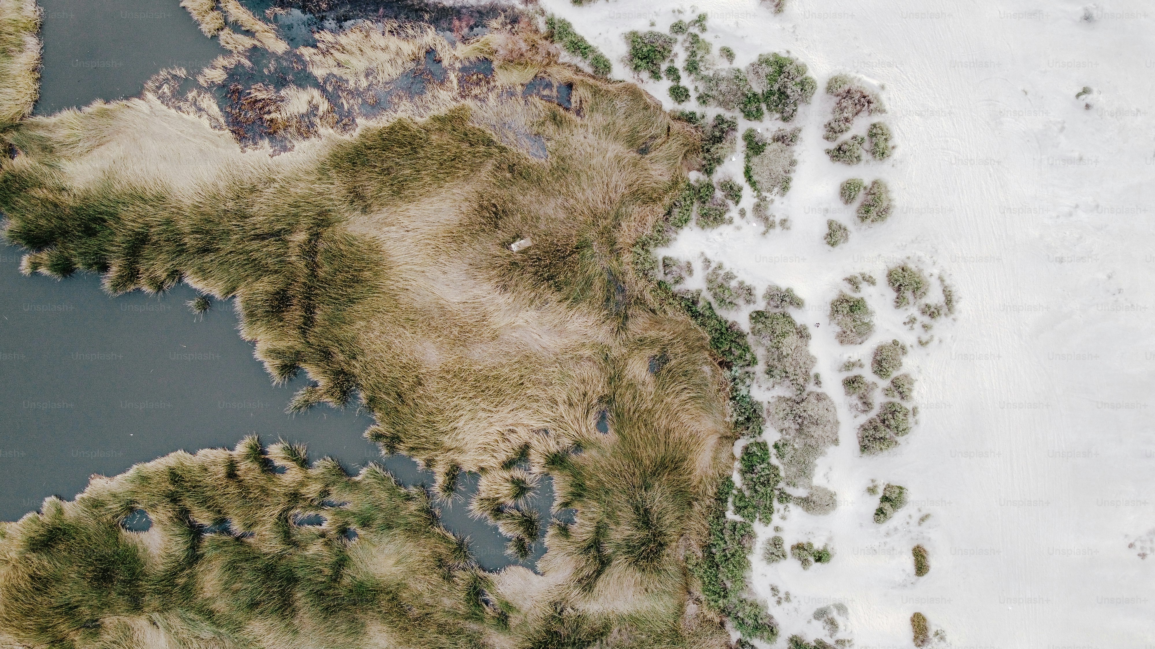 a bird's eye view of a snow covered landscape
