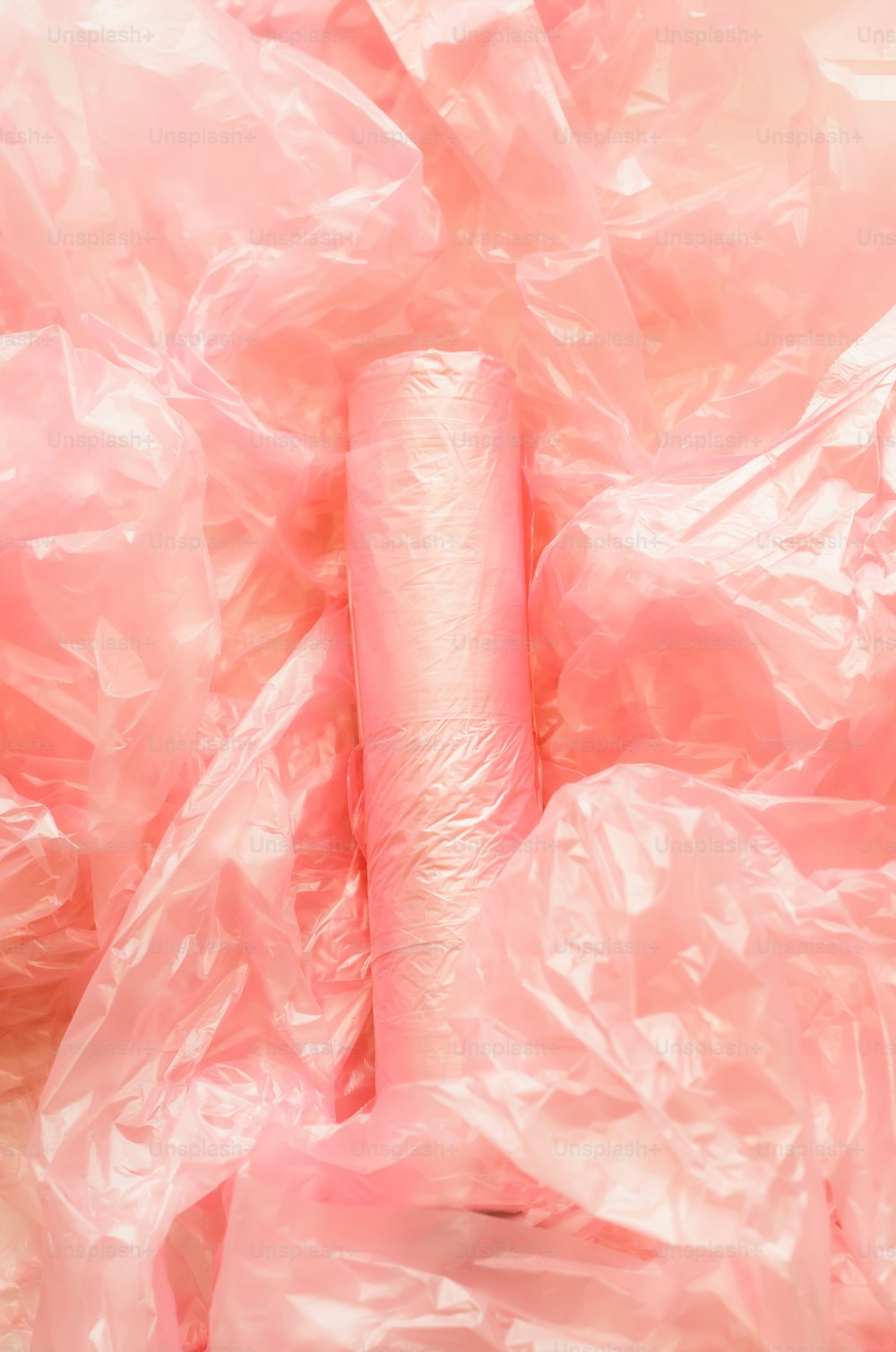 a roll of toilet paper wrapped in plastic
