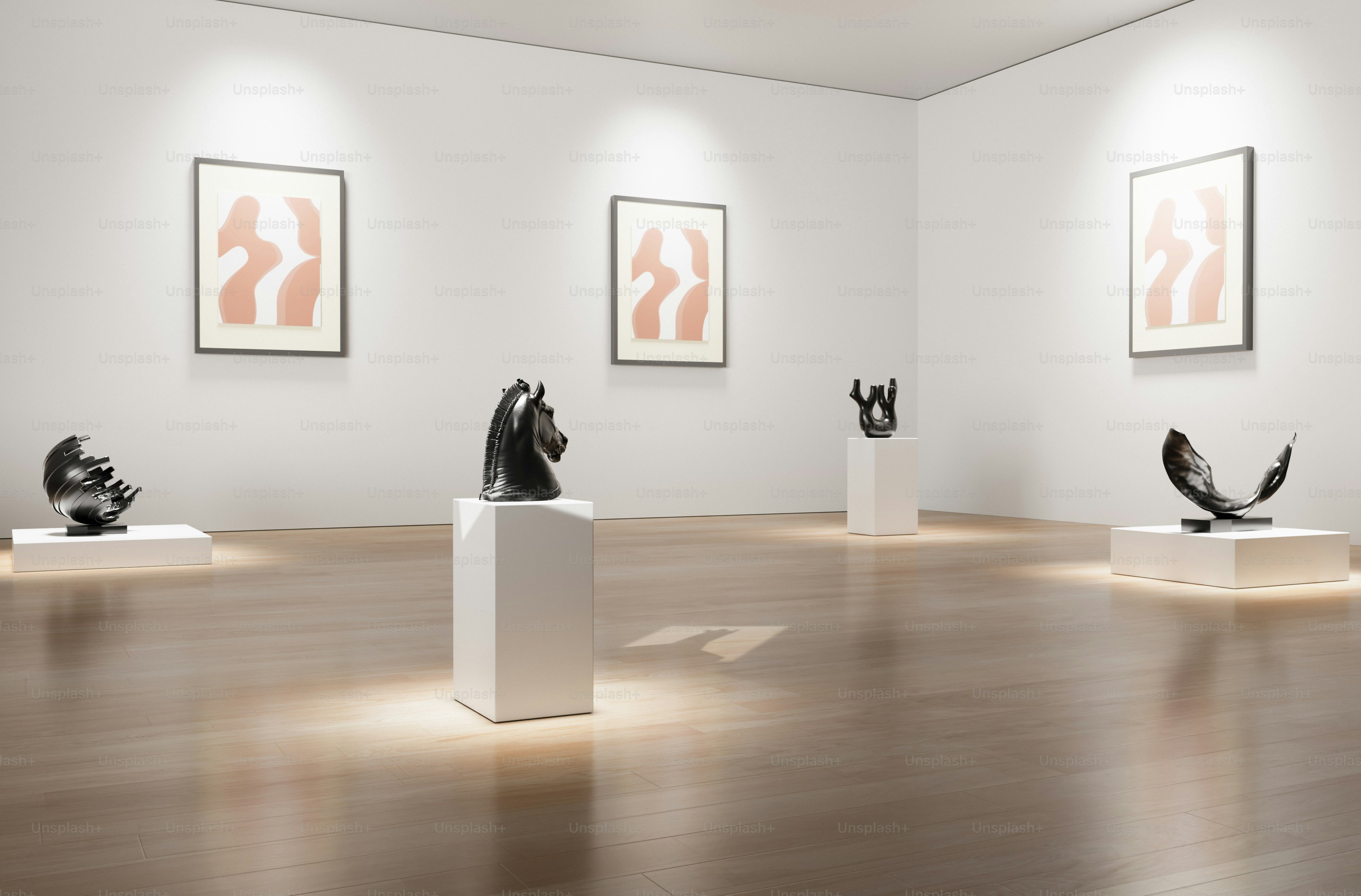 a group of sculptures sitting on top of white pedestals