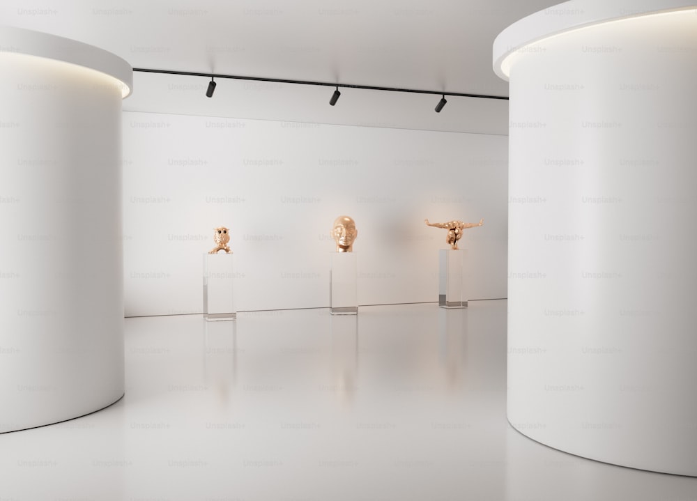 a room filled with white walls and sculptures