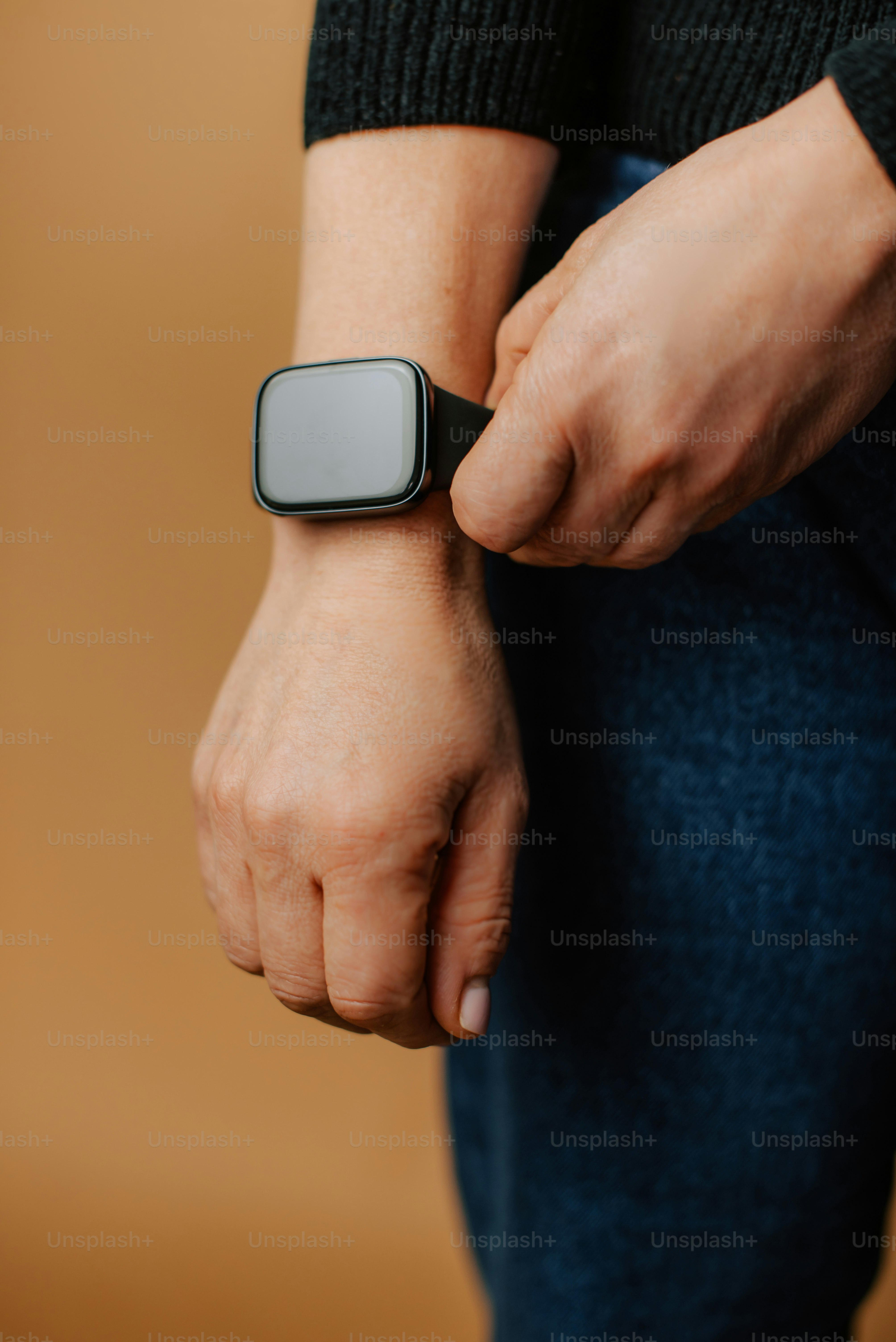 a person with a smart watch on their wrist