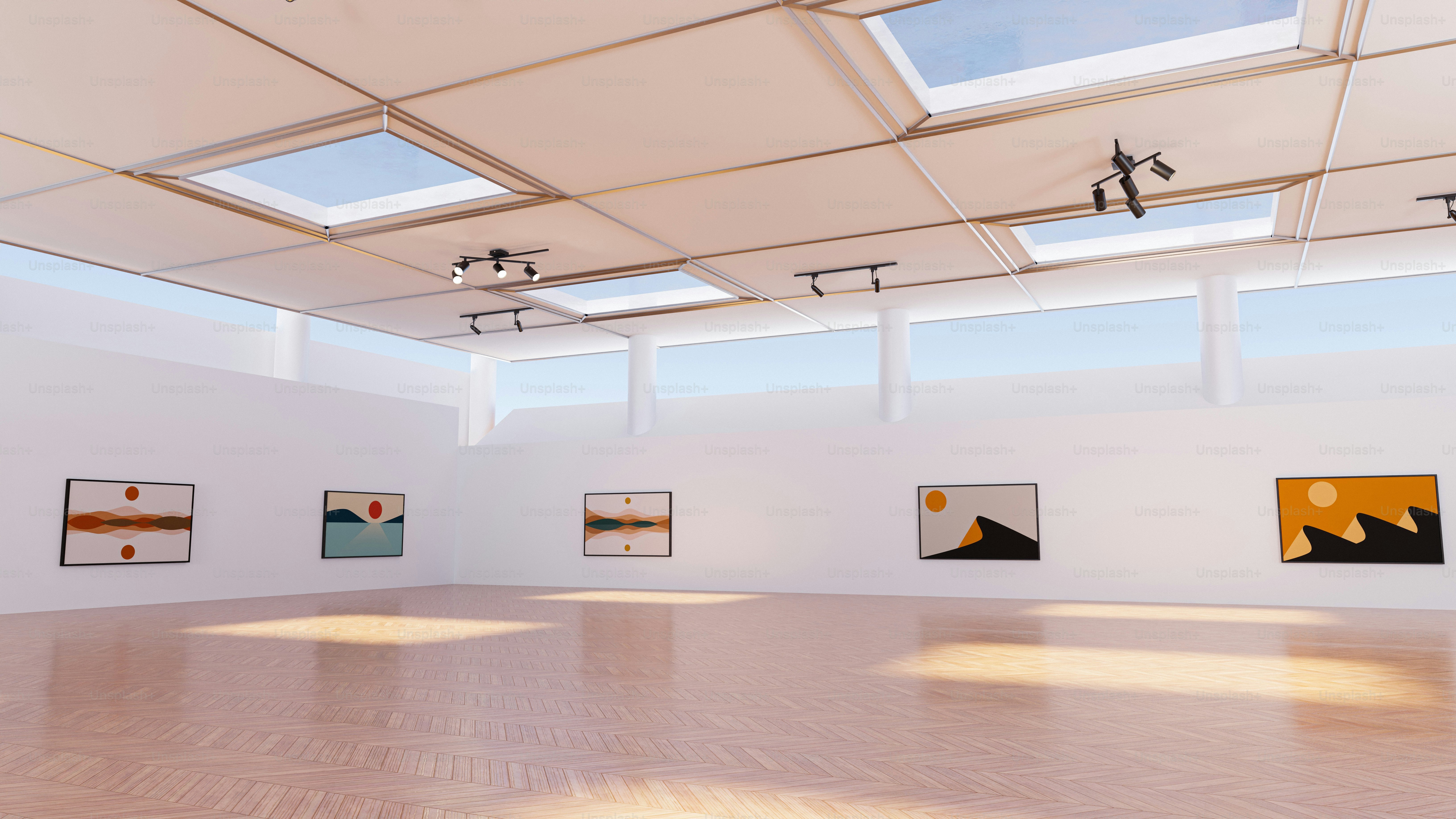 an empty room with paintings on the wall