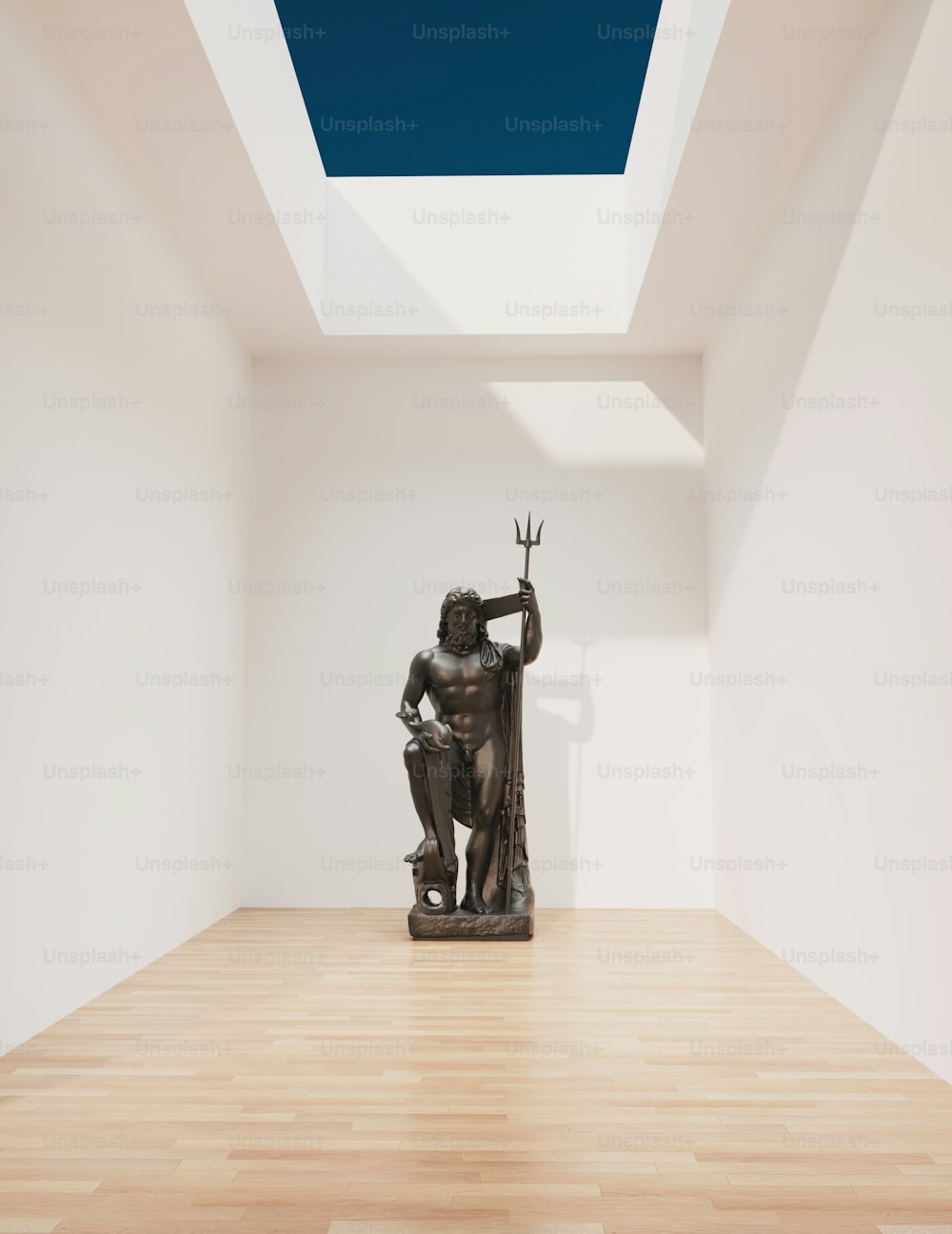 a statue in a room with a skylight