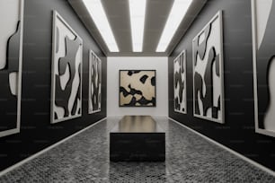 um corredor preto e branco com pinturas na parede