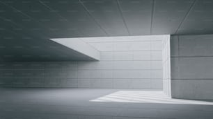 an empty room with concrete walls and a window