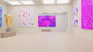 a white room with paintings on the walls