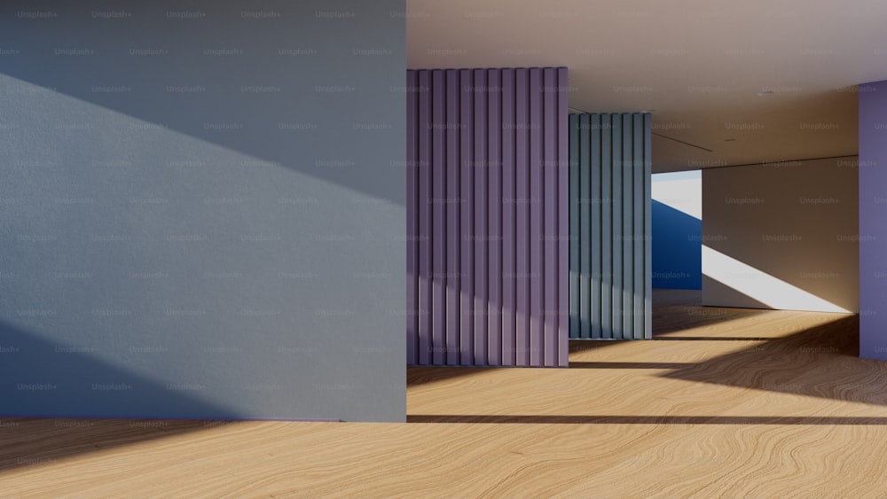a room with purple and blue walls and a wooden floor
