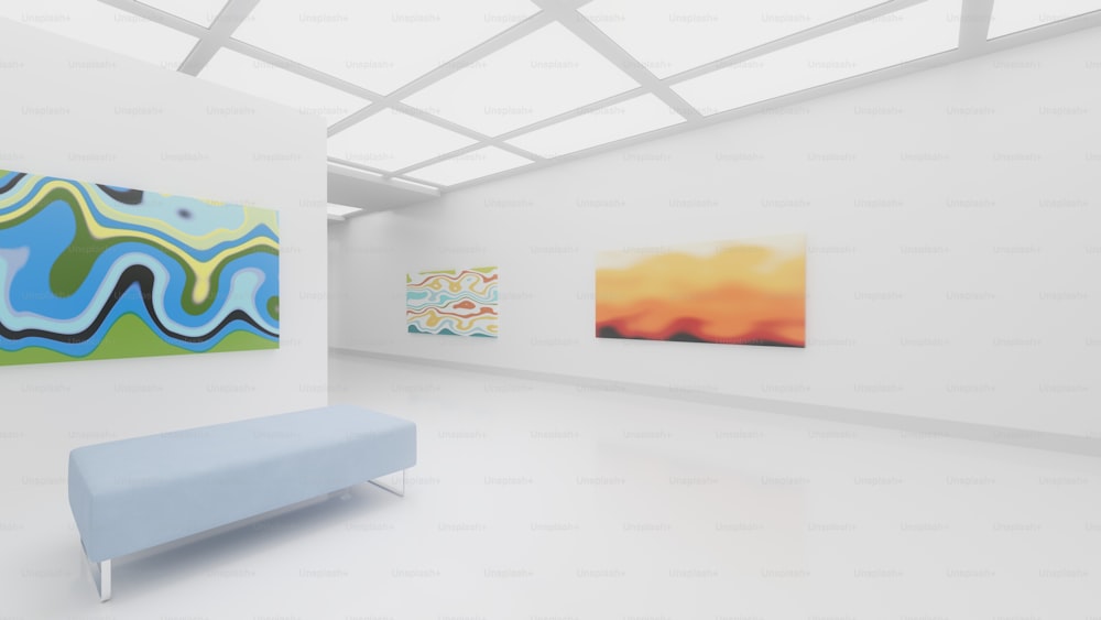 a white room with paintings on the wall