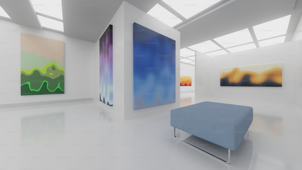 a white room with paintings on the wall