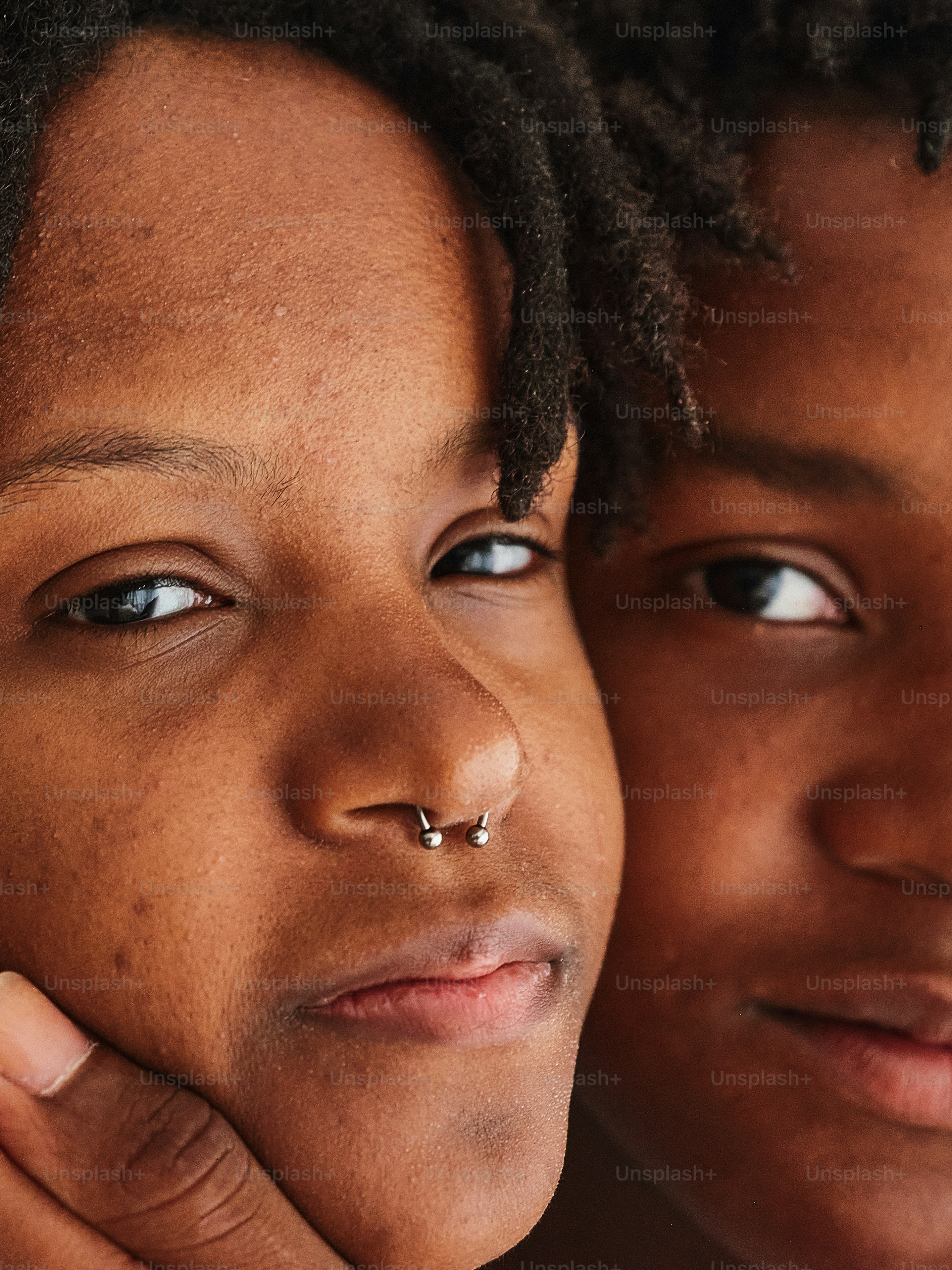 a close up of a person with a nose piercing