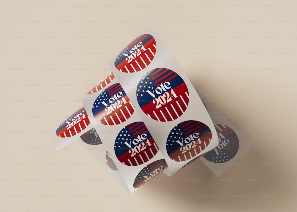 a roll of vote stickers on top of a table