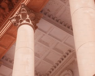 a close up of two pillars in a building