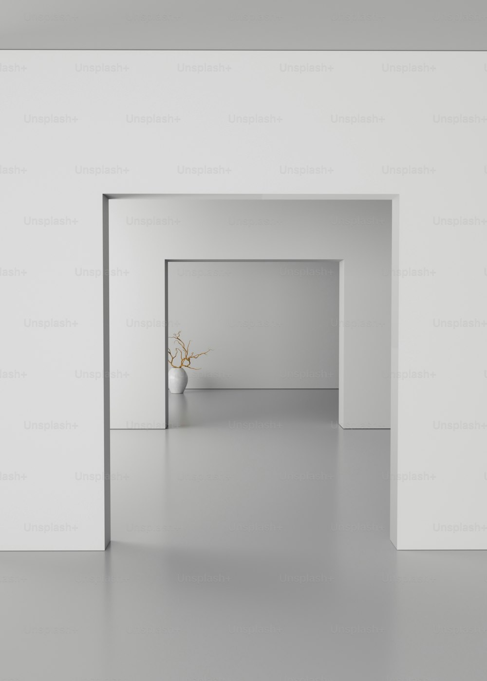 a white room with a vase with a flower in it