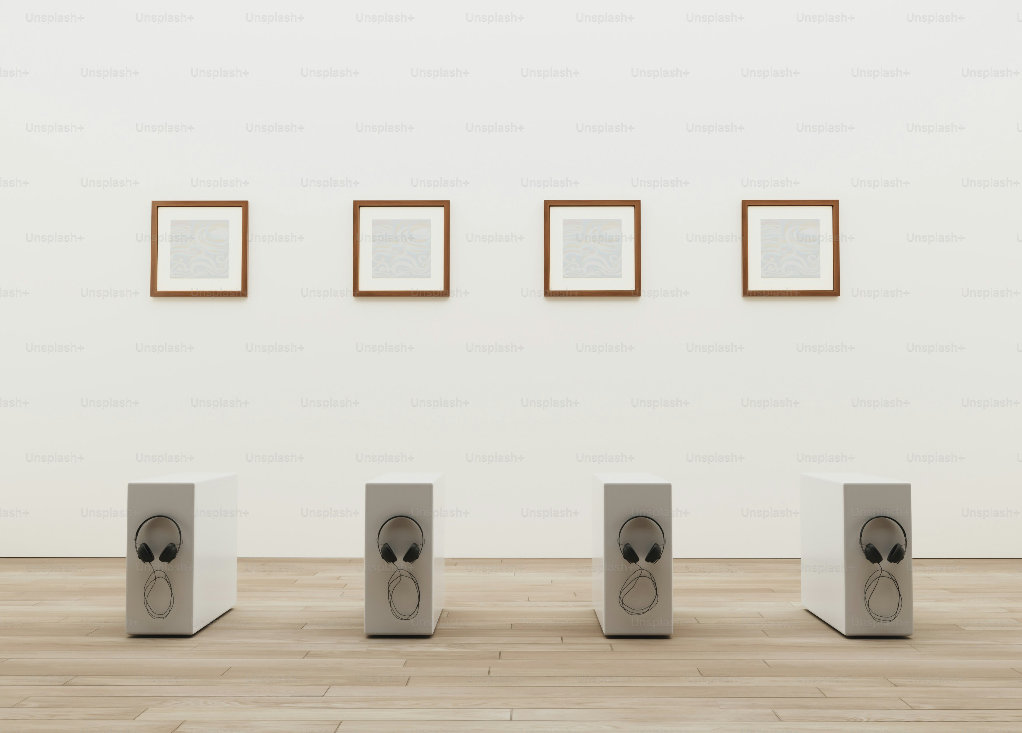 a group of speakers sitting on top of a wooden floor
