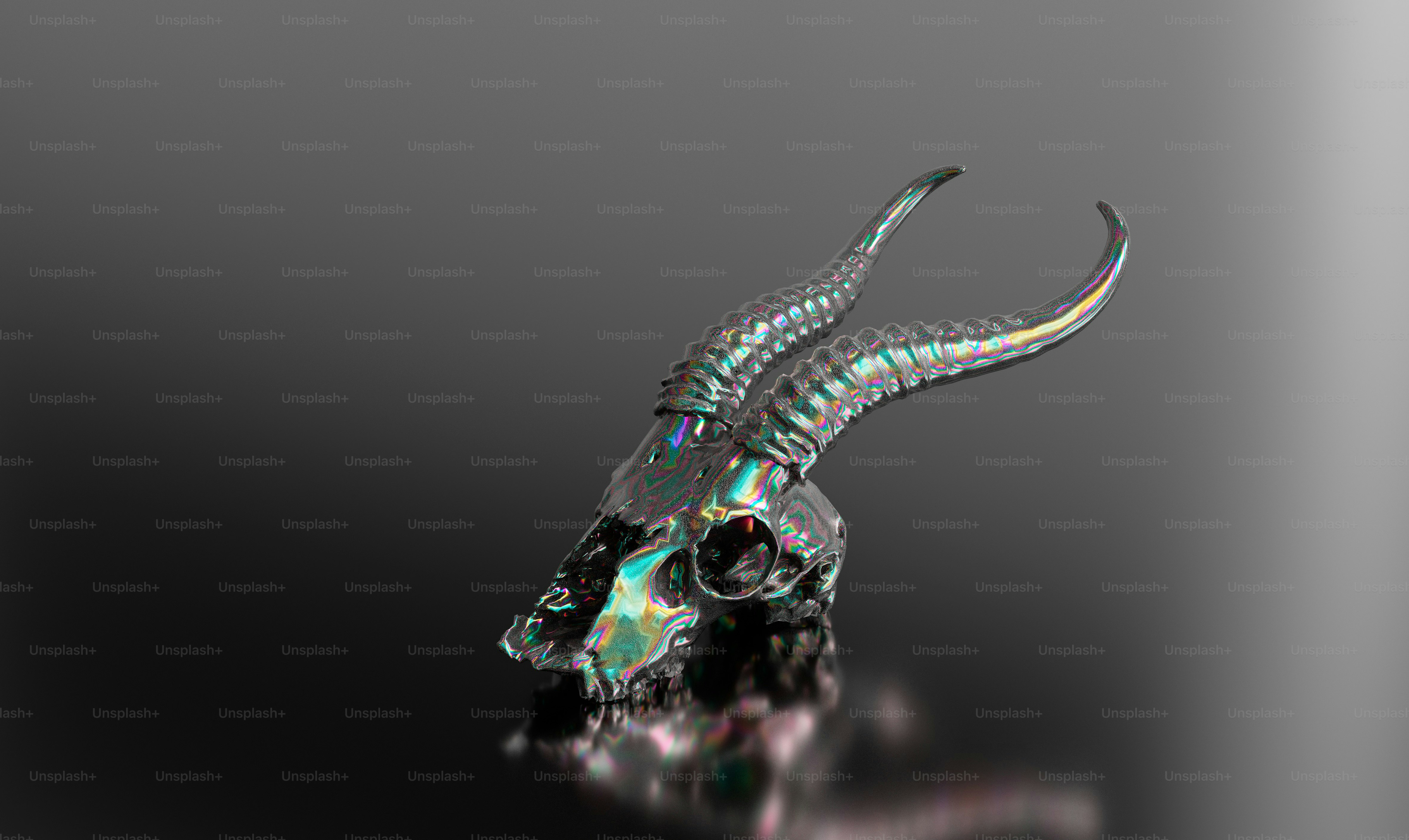 a crystal bull skull with horns on a reflective surface