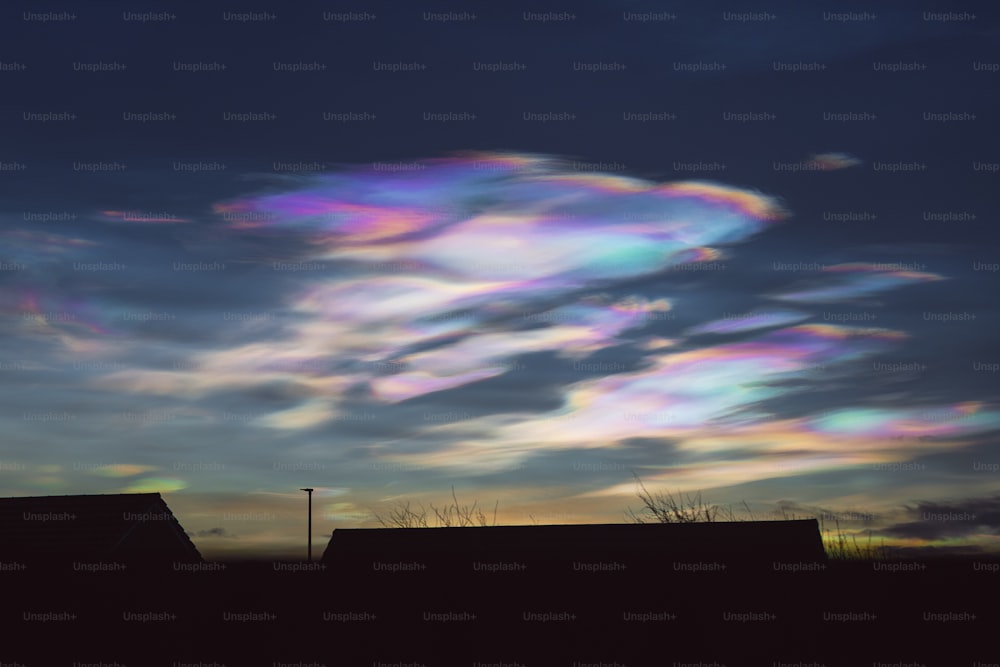 a group of clouds that are in the sky