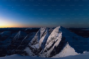 a view of the top of a mountain at night