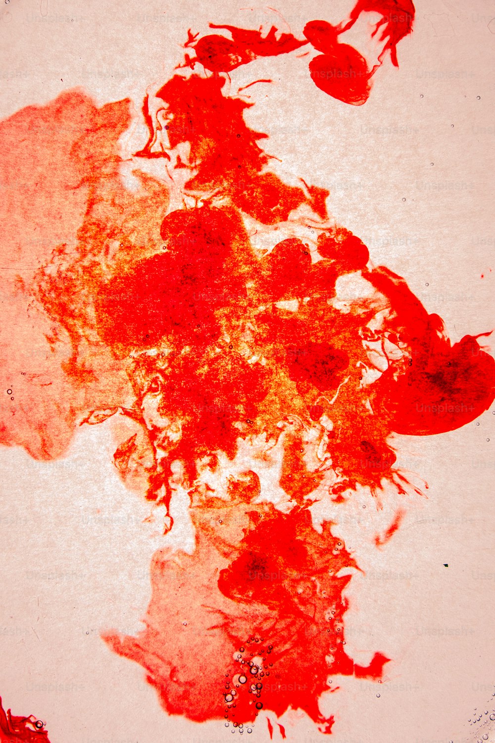 a piece of paper with red ink on it