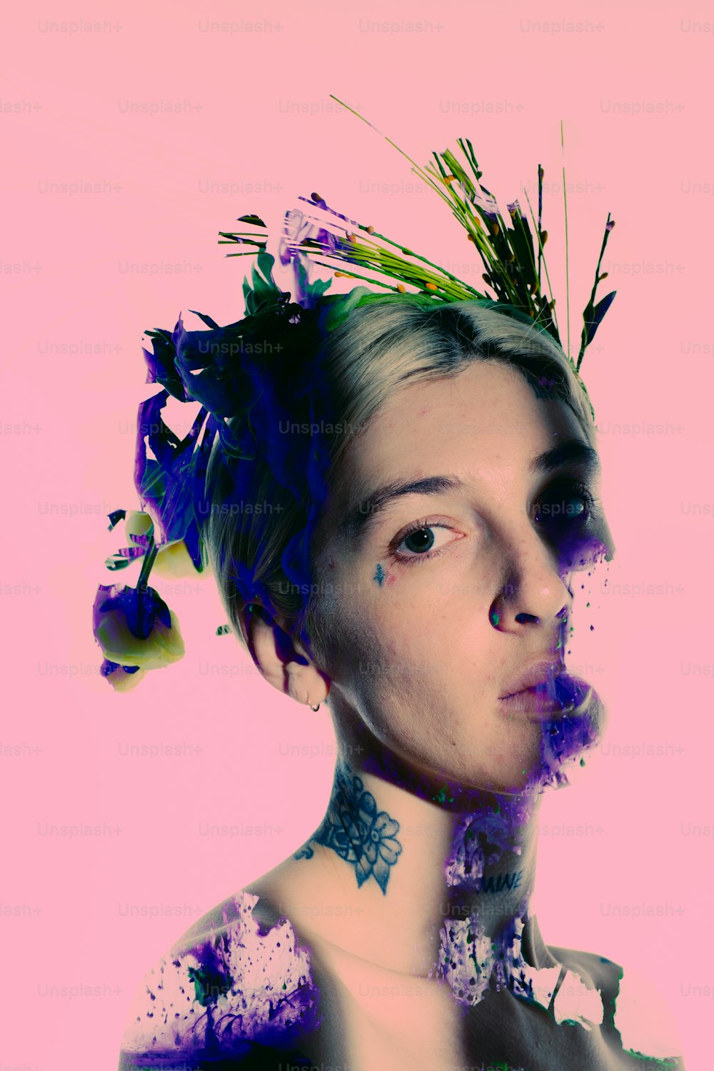a woman with tattoos and flowers on her head