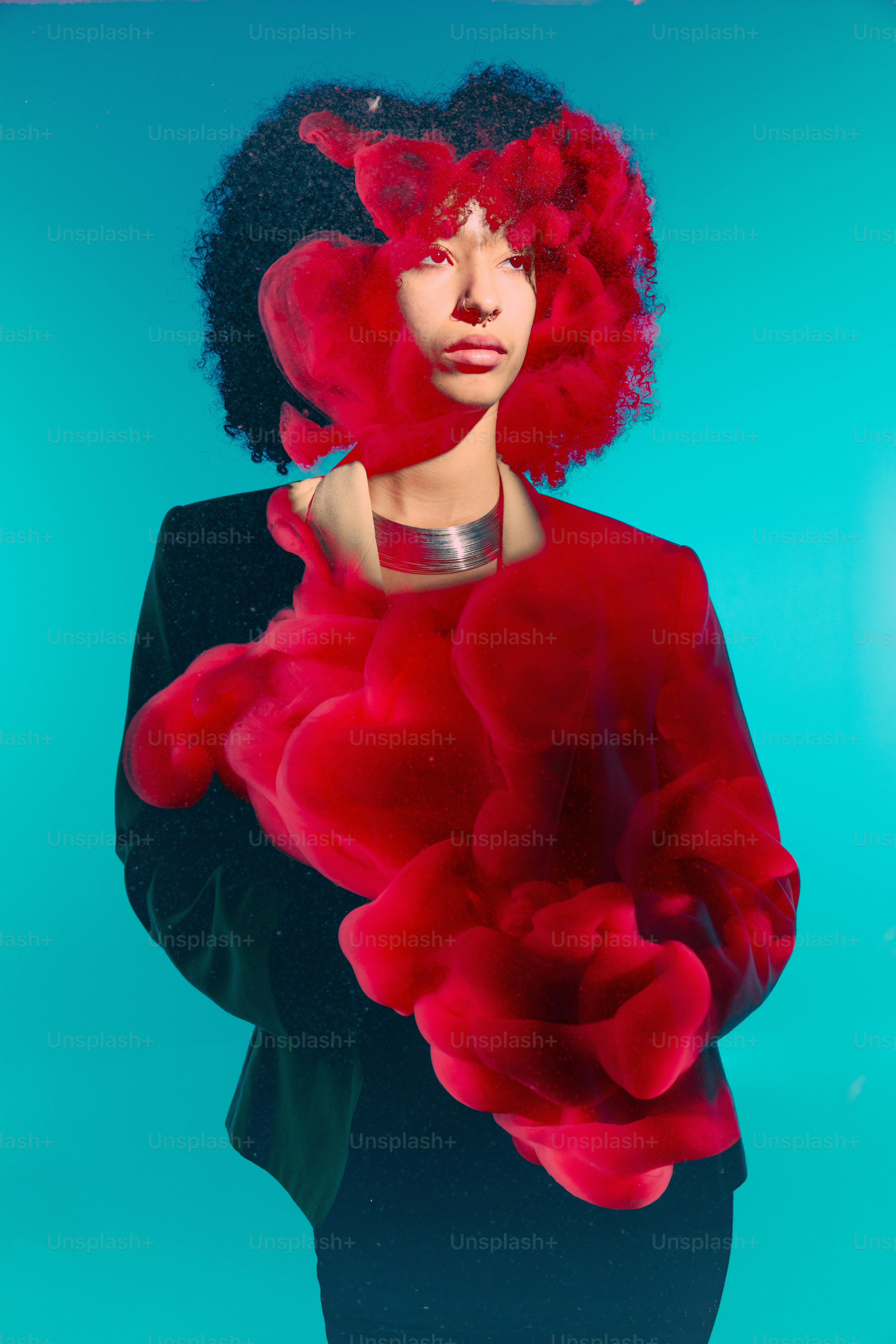 A woman with red hair is wearing a red dress photo – Red Image on Unsplash