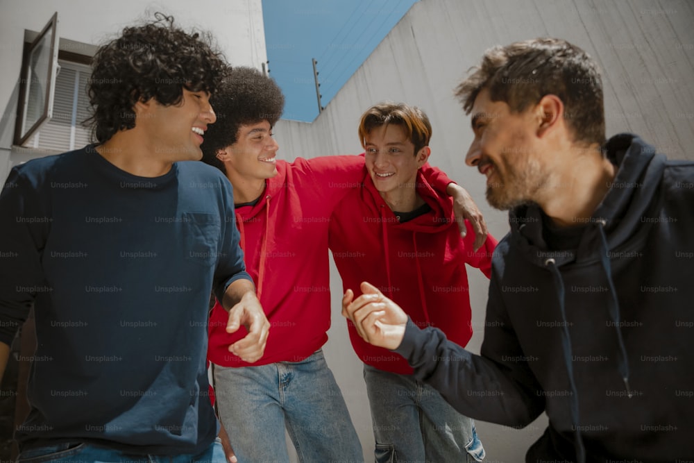 a group of young men standing next to each other